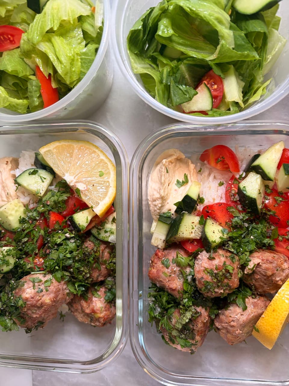 Mother Verde meal prep with salads, meatballs, rice, and fresh vegetables